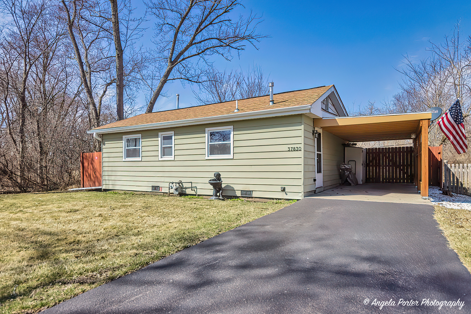 37830 North Watts Avenue Spring Grove, IL 60081 - Photo 1 of 20 a view of a house with backyard and trees
