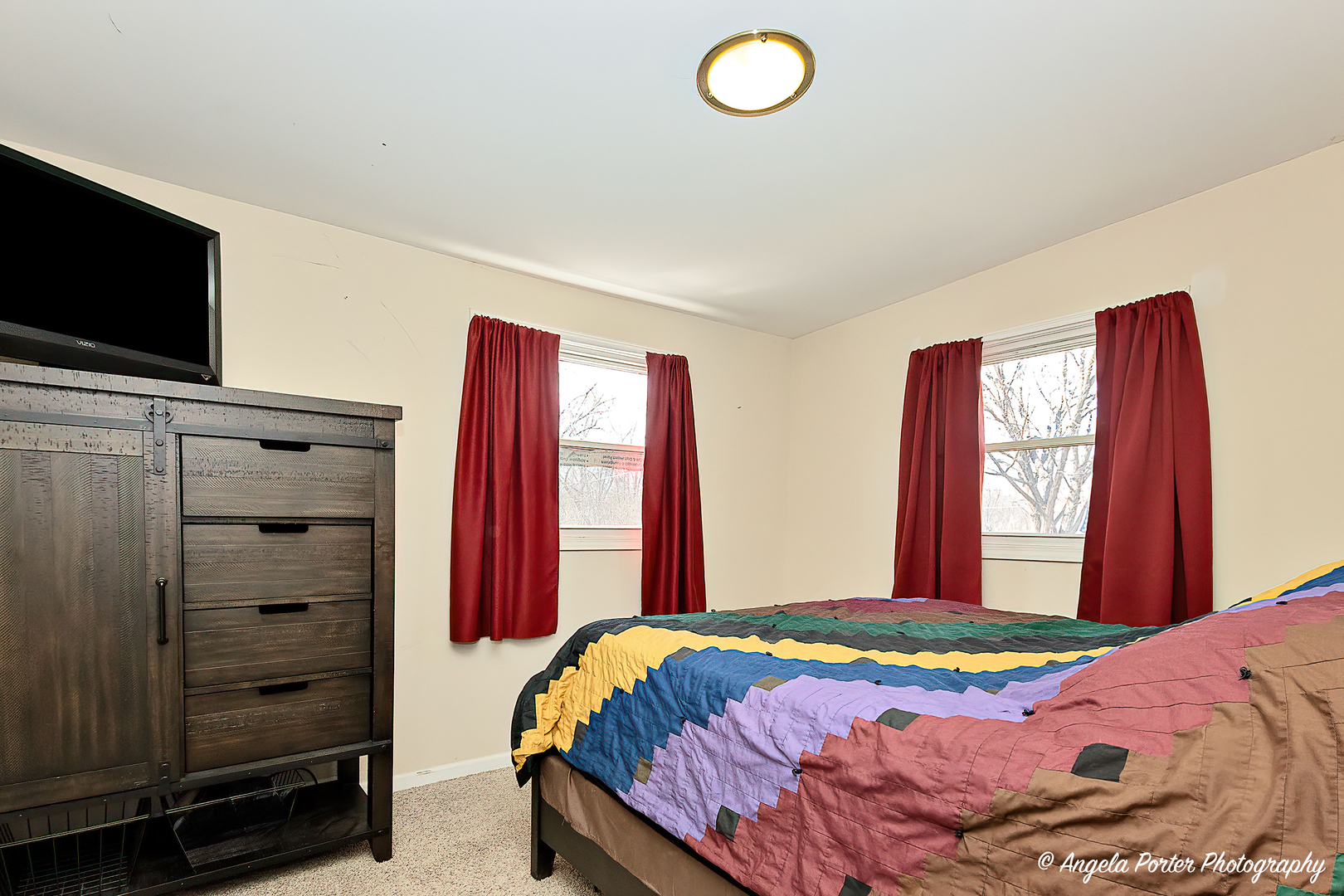 37830 North Watts Avenue Spring Grove, IL 60081 - Photo 13 of 20 a bedroom with a bed and a flat screen tv