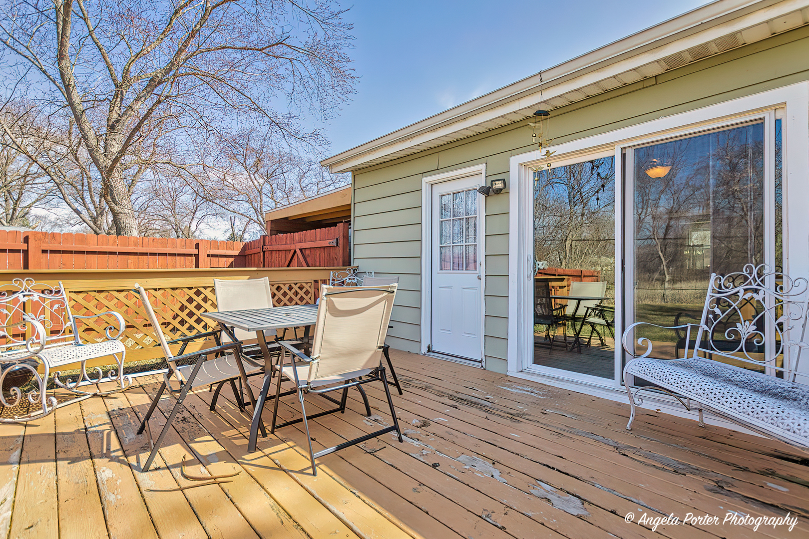 37830 North Watts Avenue Spring Grove, IL 60081 - Photo 20 of 20 a view of a patio with table and chairs and wooden floor