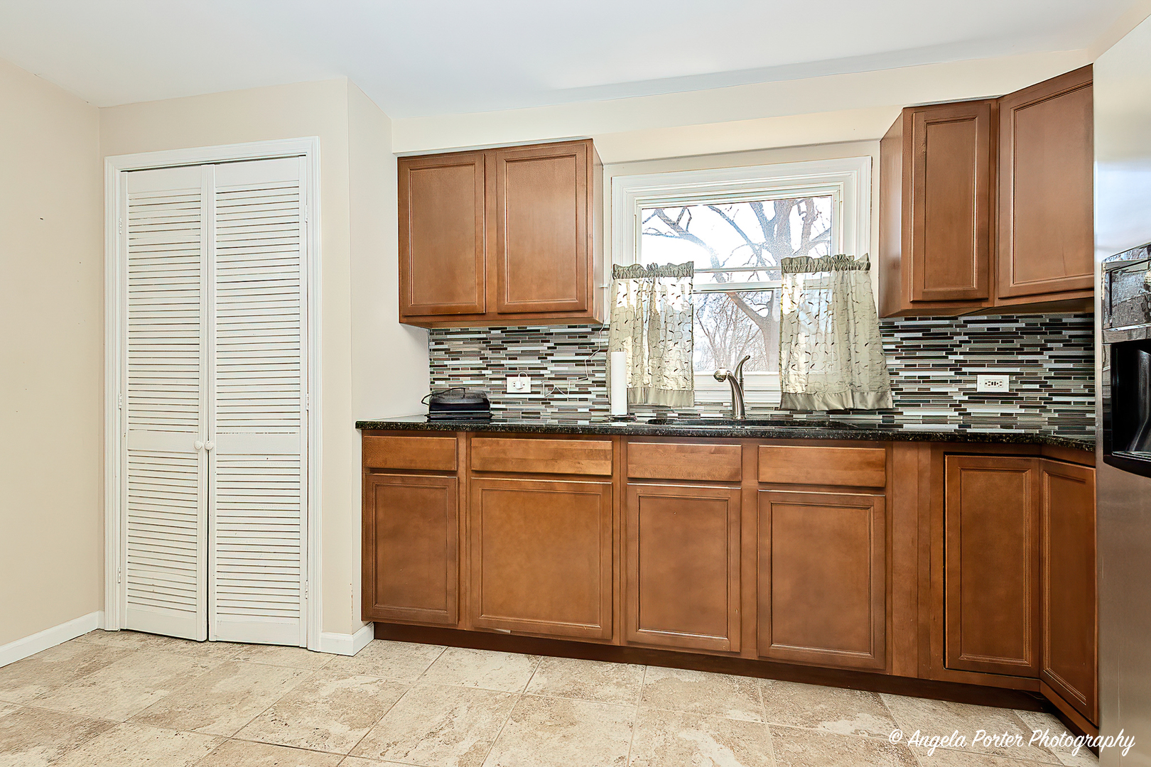 37830 North Watts Avenue Spring Grove, IL 60081 - Photo 6 of 20 a kitchen with stainless steel appliances granite countertop a sink and a window