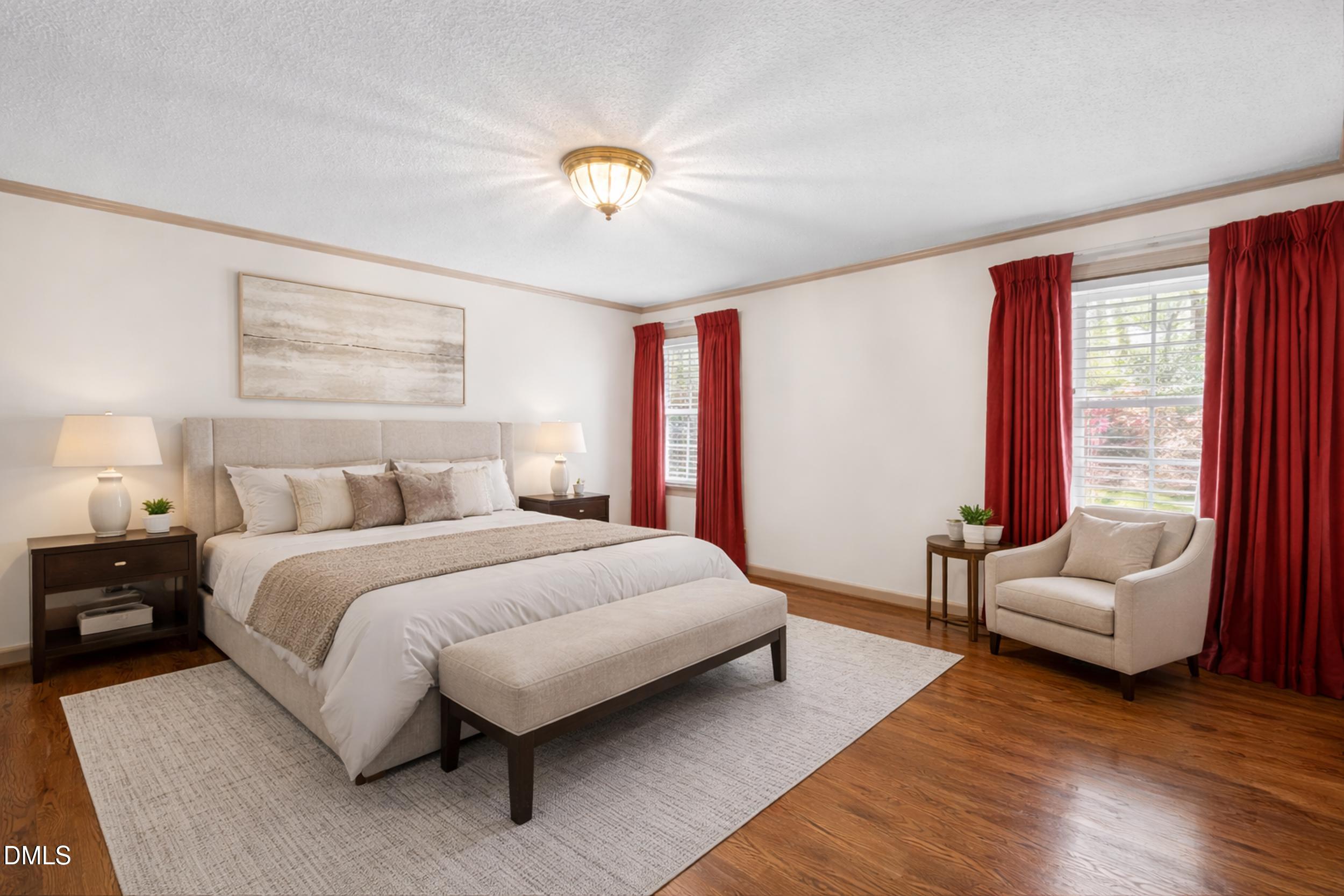 109 Queensferry Road Cary, NC 27511 - Photo 23 of 48 a spacious bedroom with a bed and a couch