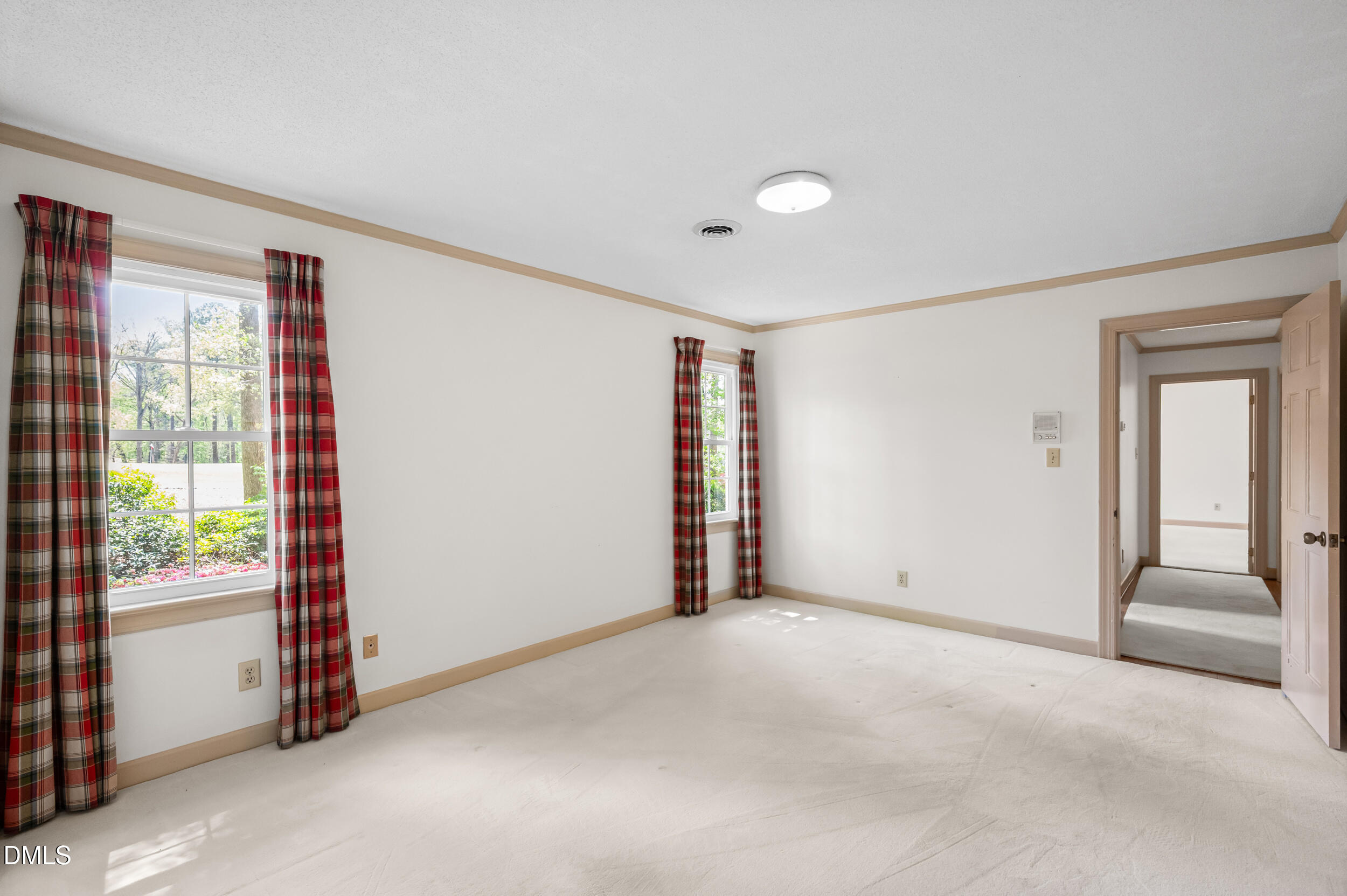 109 Queensferry Road Cary, NC 27511 - Photo 28 of 48 a view of an empty room with a window