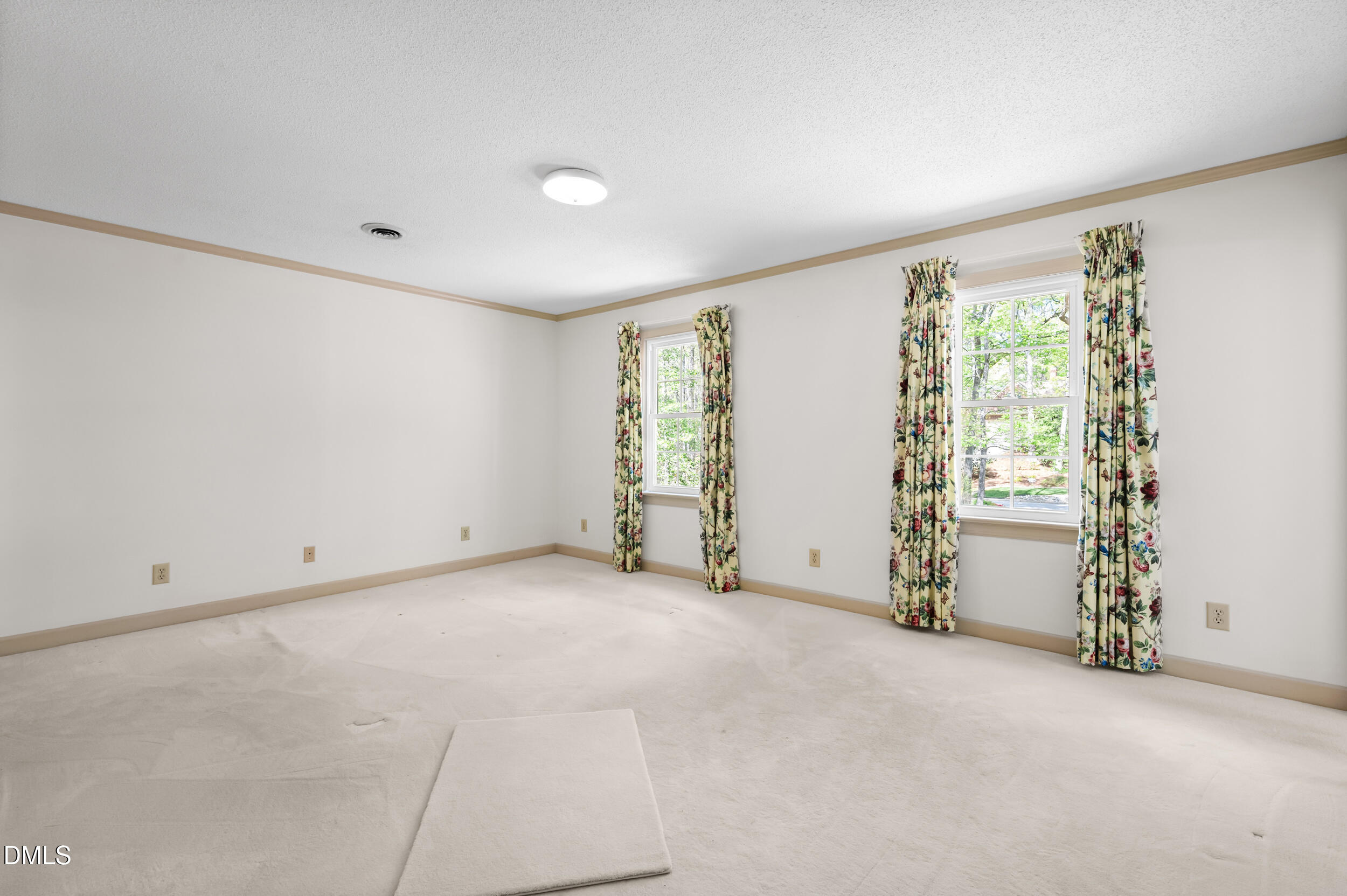 109 Queensferry Road Cary, NC 27511 - Photo 29 of 48 an empty room with windows
