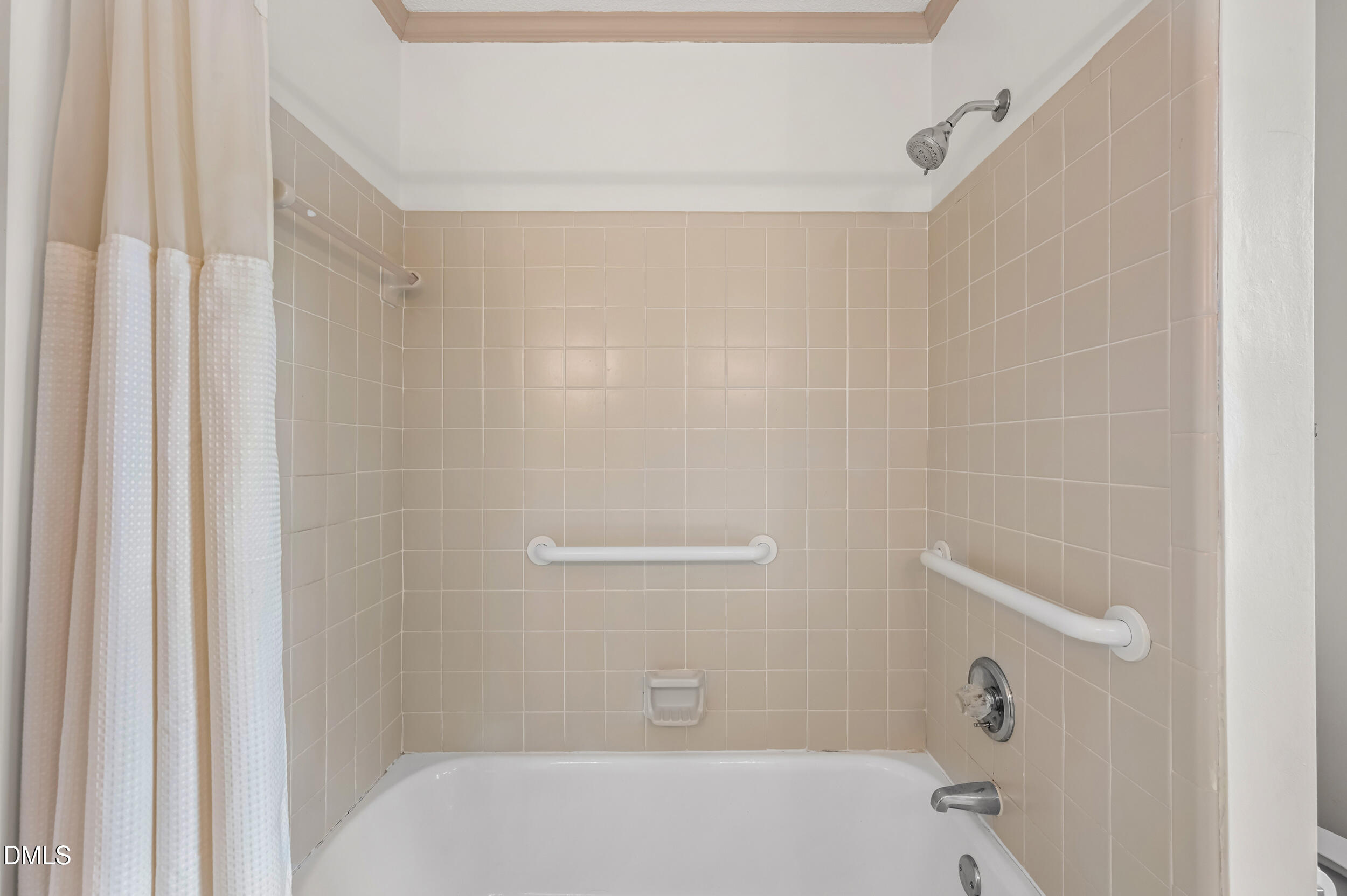 109 Queensferry Road Cary, NC 27511 - Photo 32 of 48 a bathroom with a bathtub and a shower