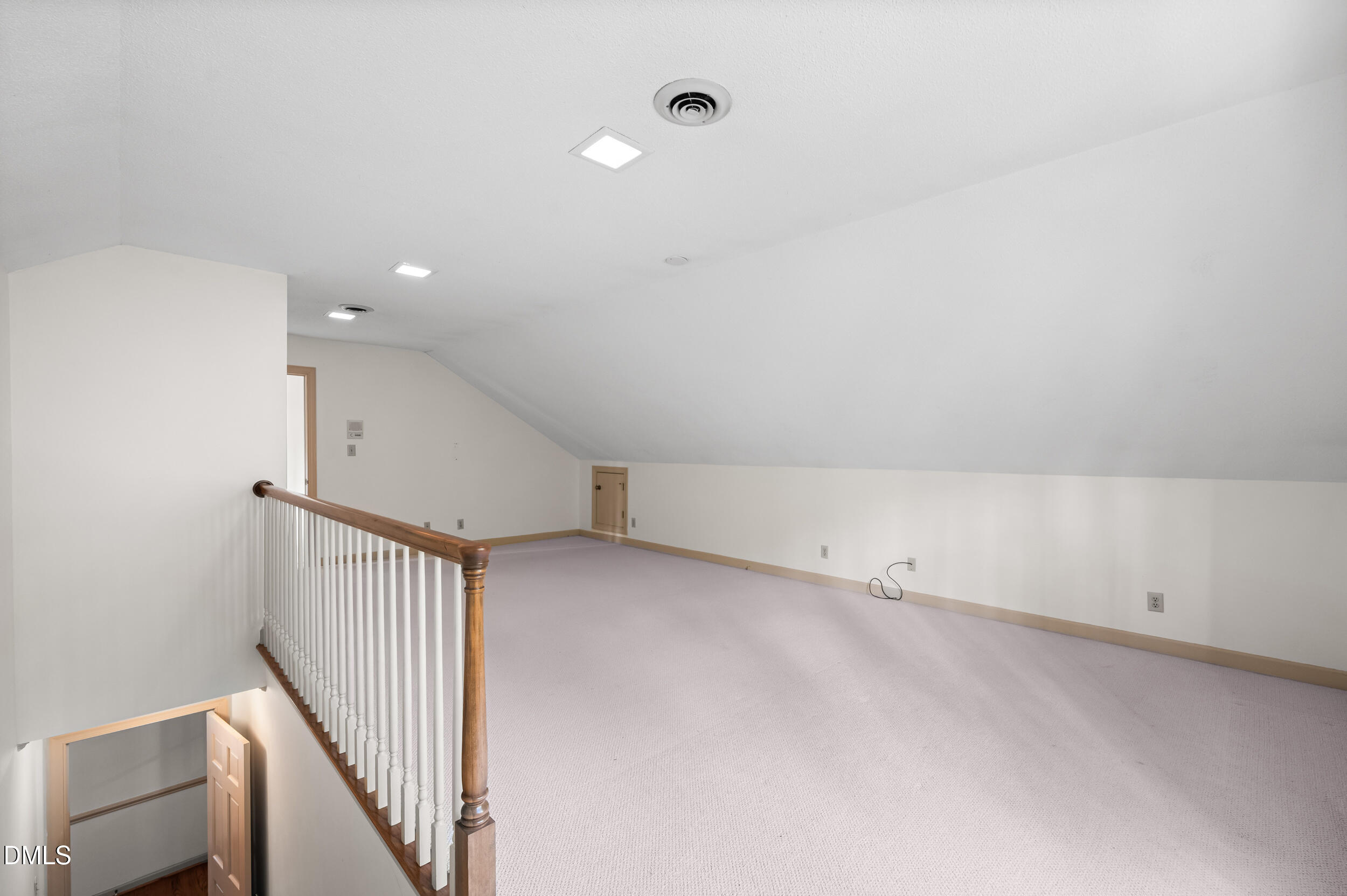 109 Queensferry Road Cary, NC 27511 - Photo 35 of 48 a view of a room with stairs and white walls