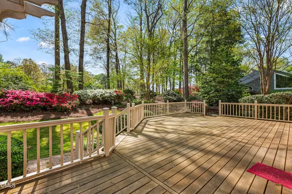 a view of a porch with wooden floor