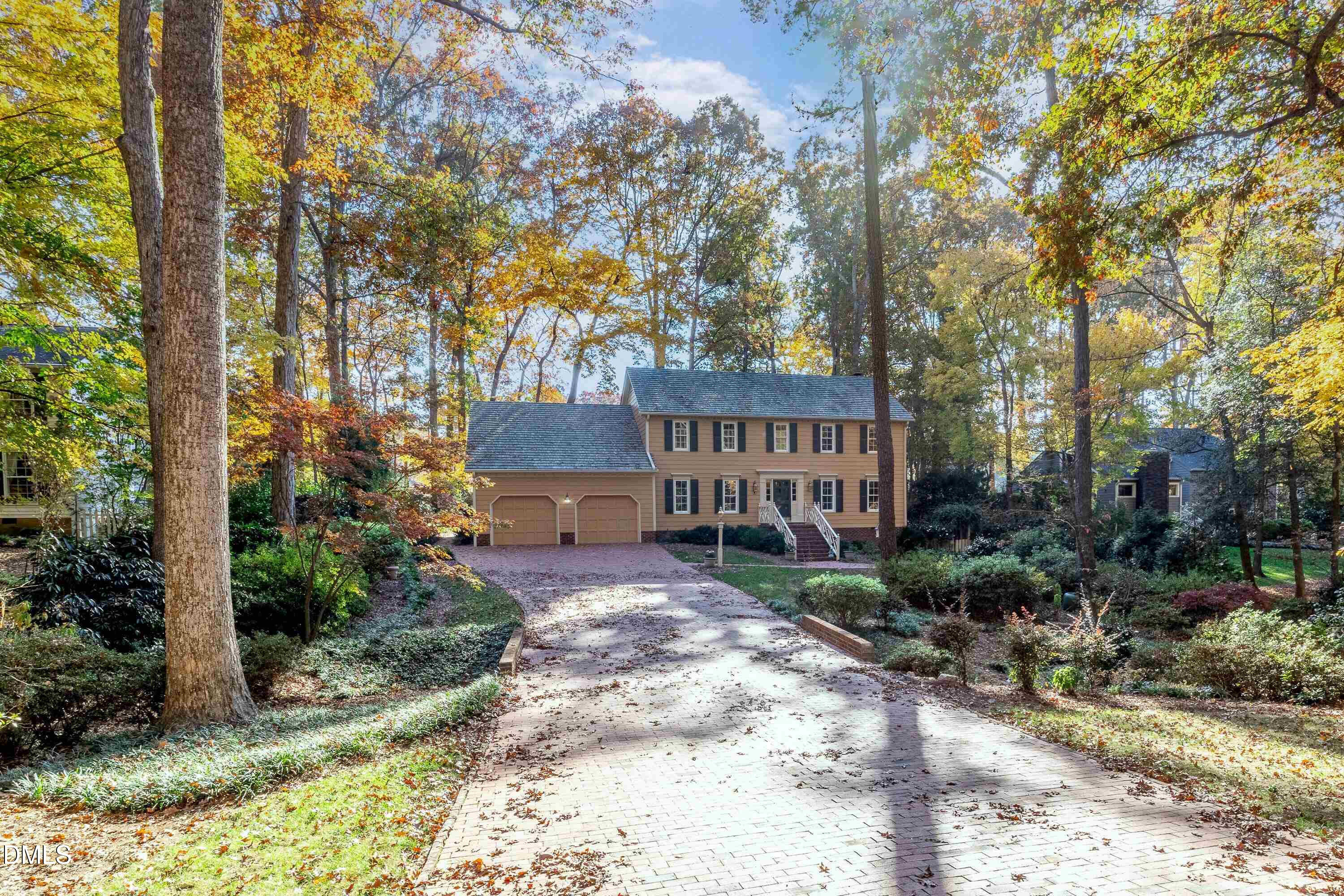109 Queensferry Road Cary, NC 27511 - Photo 46 of 48 a view of a house with a yard and sitting area