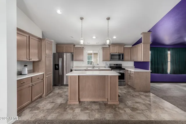 a large kitchen with cabinets