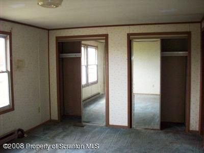 Rr1 Rr1 Montrose, PA 18801 - Photo 6 of 9 an empty room with windows and closet