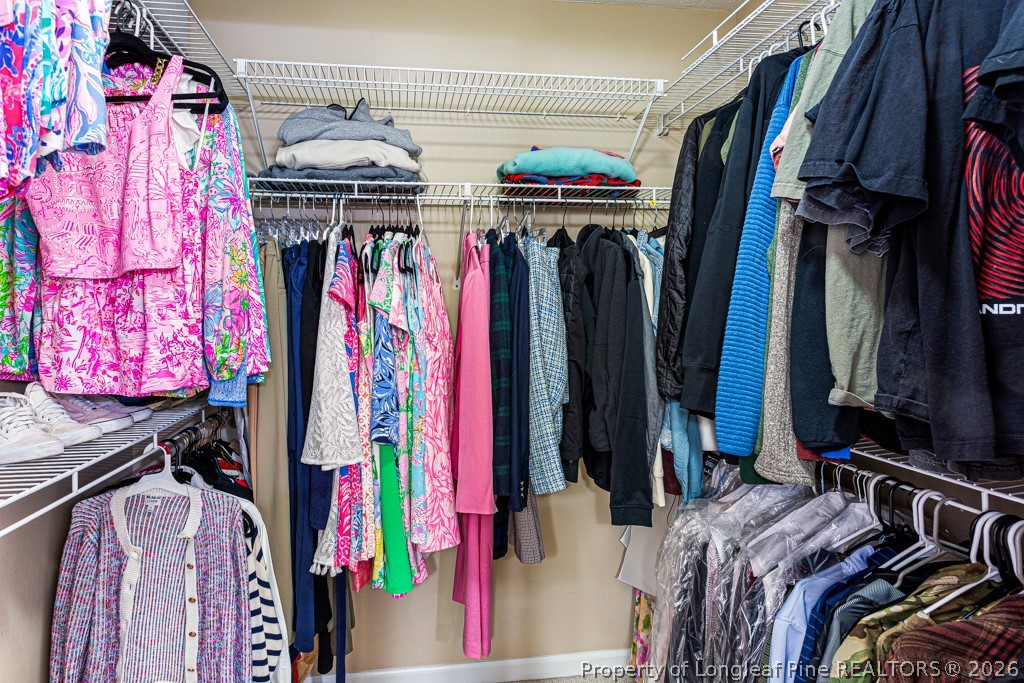 461 Lands End Road Fayetteville, NC 28314 - Photo 22 of 31 a view of walk in closet with clothes