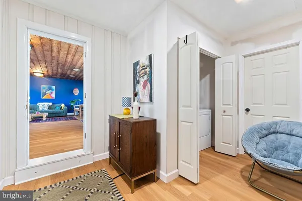 a view of room with furniture and window