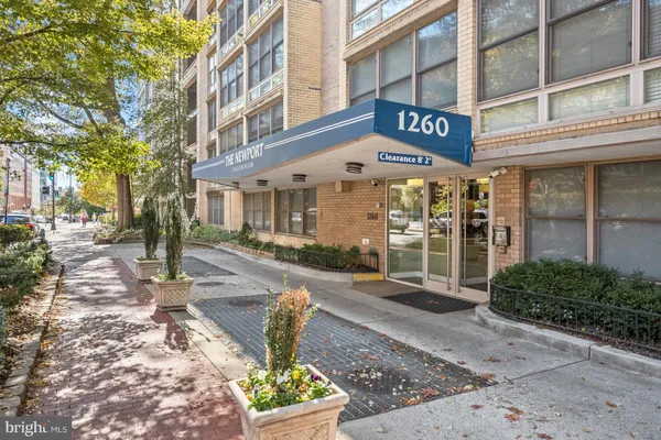 a front view of a building with street view