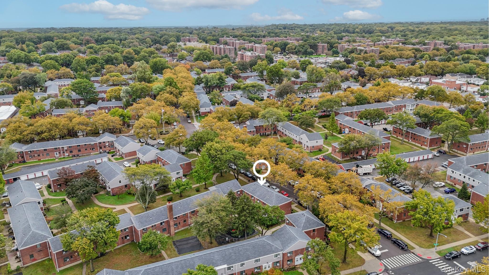 67-09 218th Street, Unit DUPLEX Queens, NY 11364 - Photo 17 of 22 an aerial view of residential houses with outdoor space