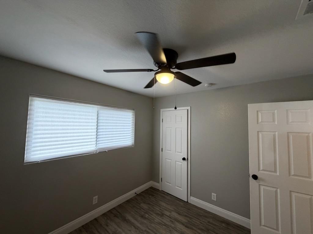 930 I Street Sanger, CA 93657 - Photo 15 of 15 a view of an empty room with a window