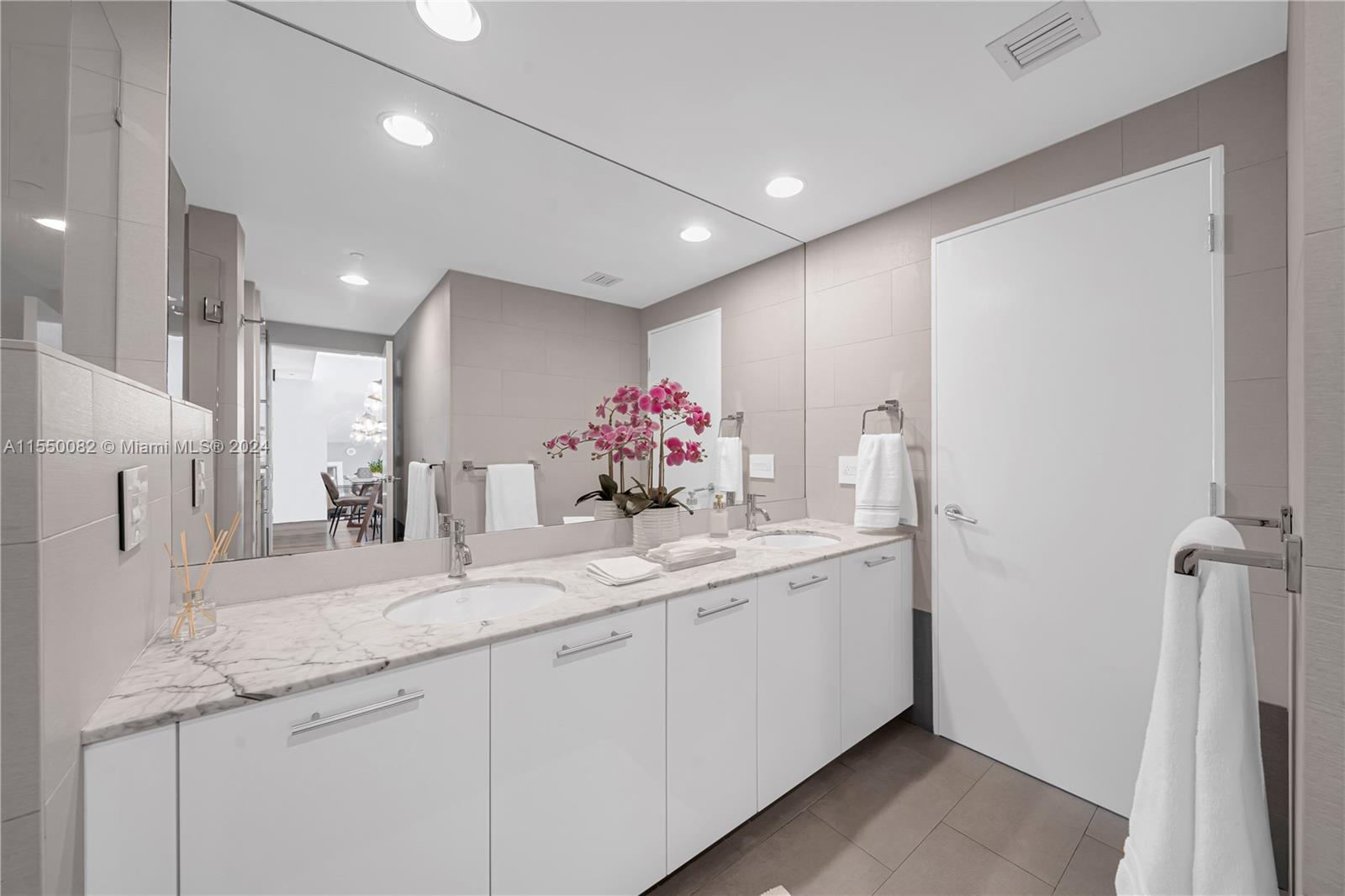 Brickell Miami, FL 33131 - Photo 24 of 61 a bathroom with a double vanity sink mirror and double