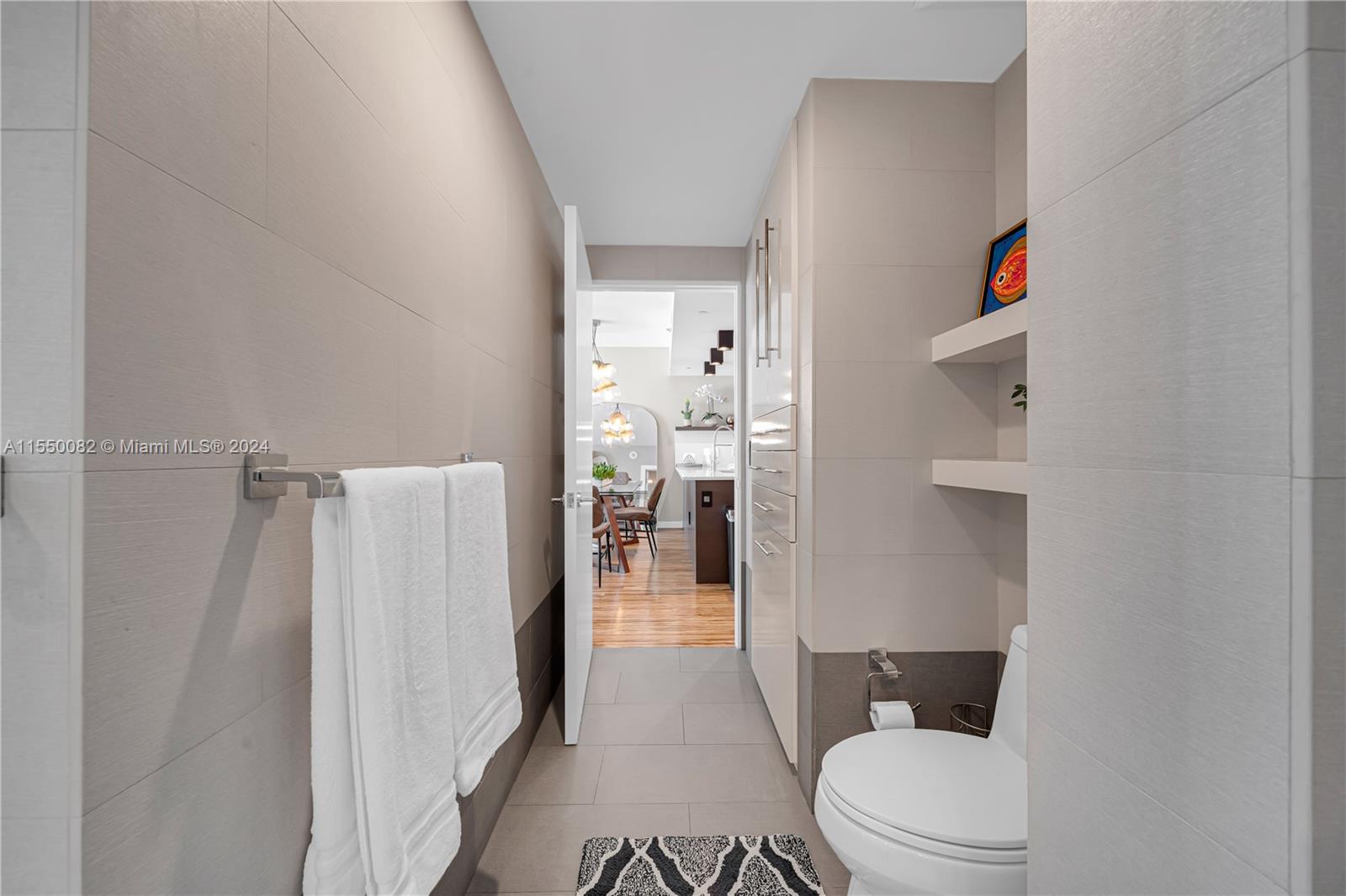 Brickell Miami, FL 33131 - Photo 28 of 61 a bathroom with a toilet and a shower