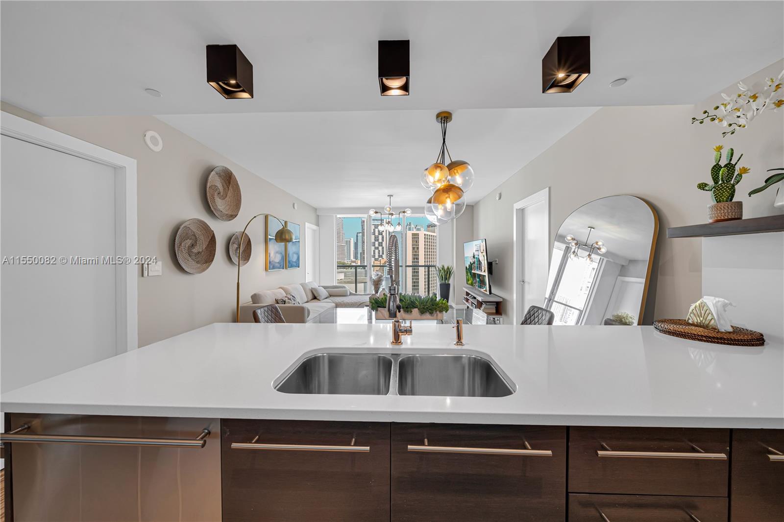 Brickell Miami, FL 33131 - Photo 4 of 61 a bathroom with a sink and a mirror