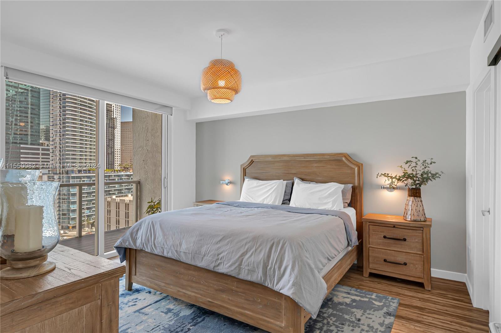 Brickell Miami, FL 33131 - Photo 43 of 61 a bedroom with a bed and a table