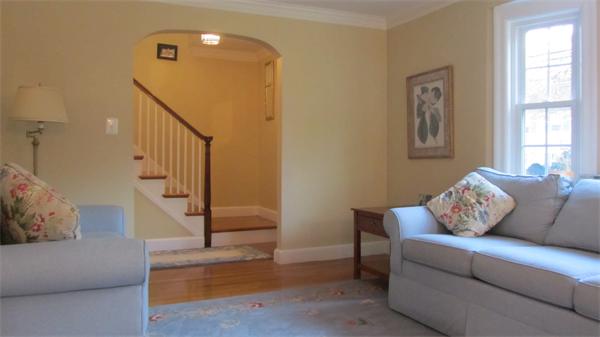 45 Clifton Road Milton, MA 02186 - Photo 8 of 19 a living room with furniture and stairs