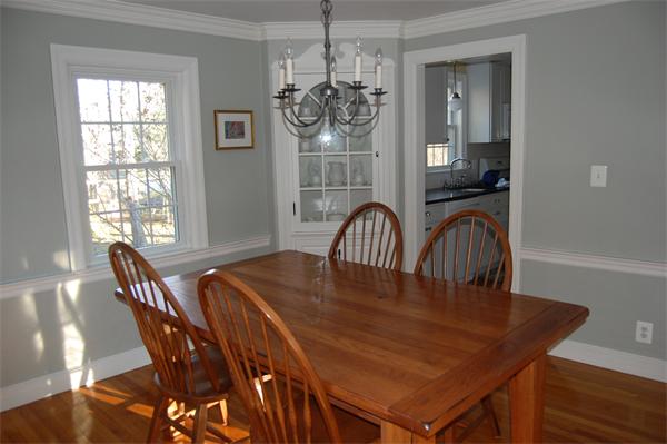 45 Clifton Road Milton, MA 02186 - Photo 9 of 19 a view of a dining room with furniture window and wooden floor