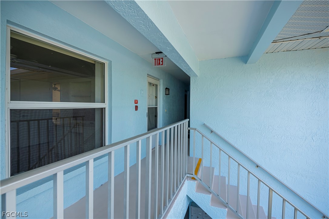 1100 Pondella Road, Unit 514 Cape Coral, FL 33909 - Photo 32 of 34 a view of stairs