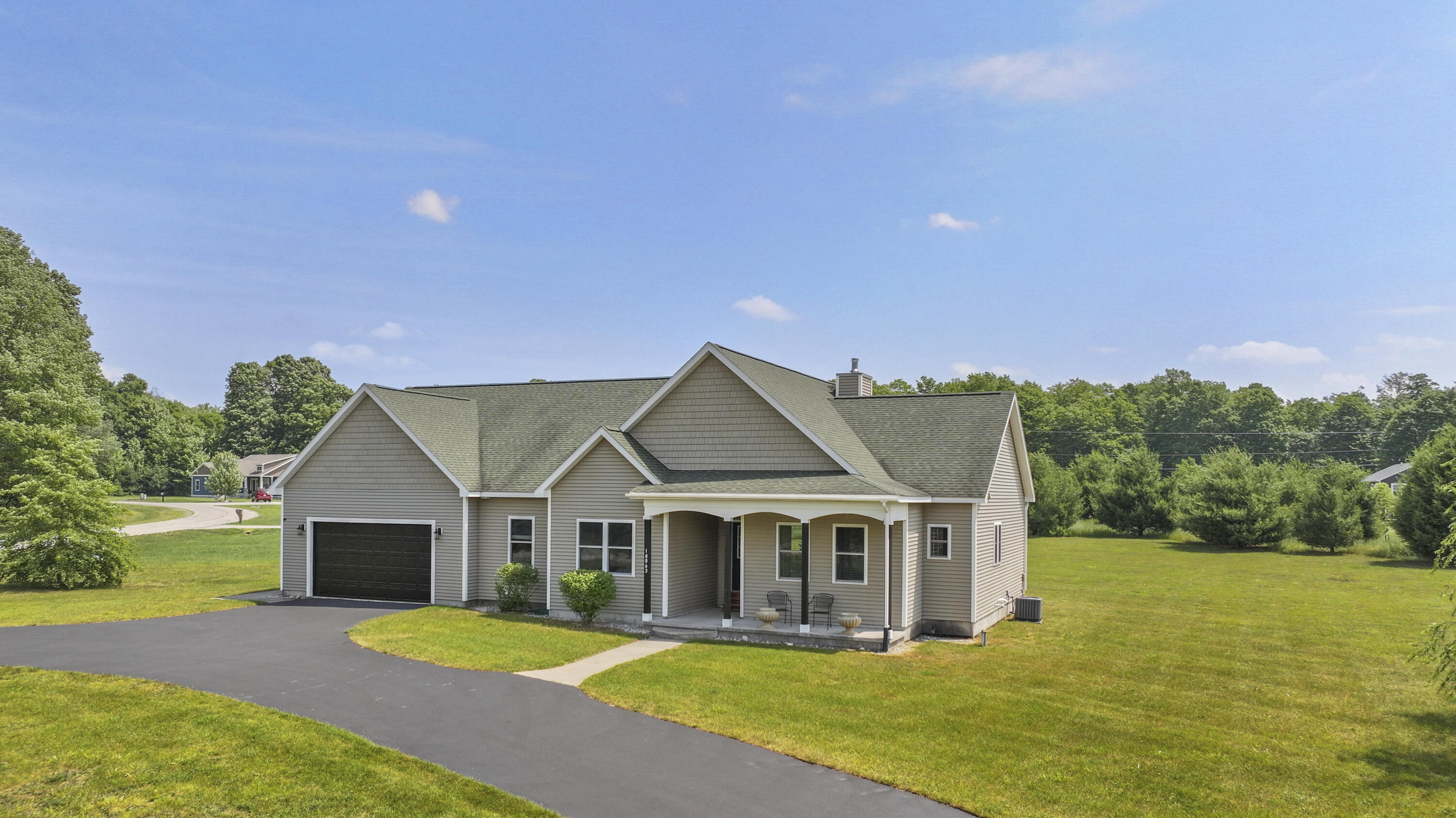 18863 Meadowlark Road Thompsonville, MI 49683 - Photo 2 of 58 DJI_20240617103431_0039_D