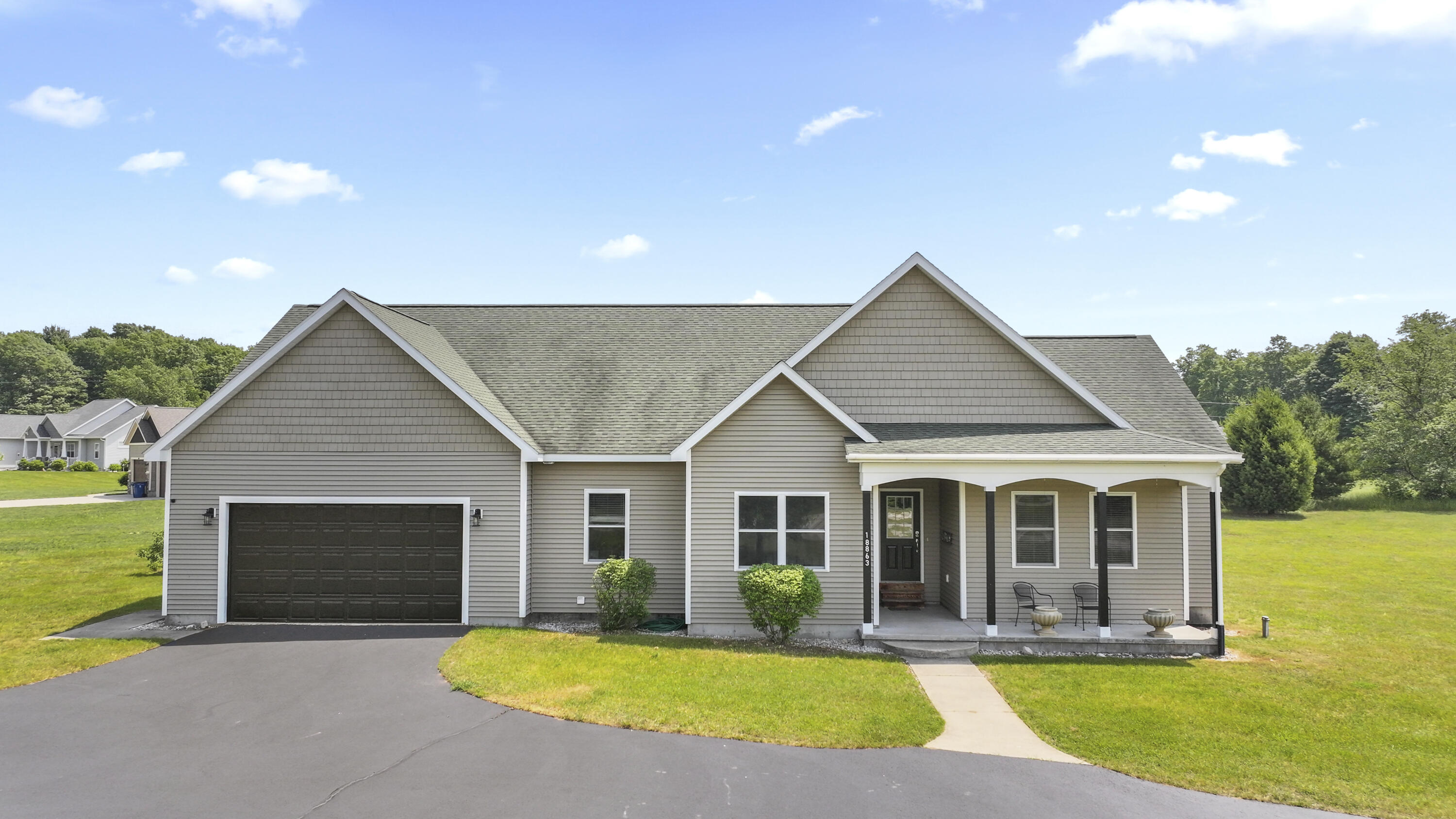 18863 Meadowlark Road Thompsonville, MI 49683 - Photo 3 of 58 DJI_20240617103505_0040_D