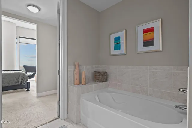 a view of a chair and tables in the balcony