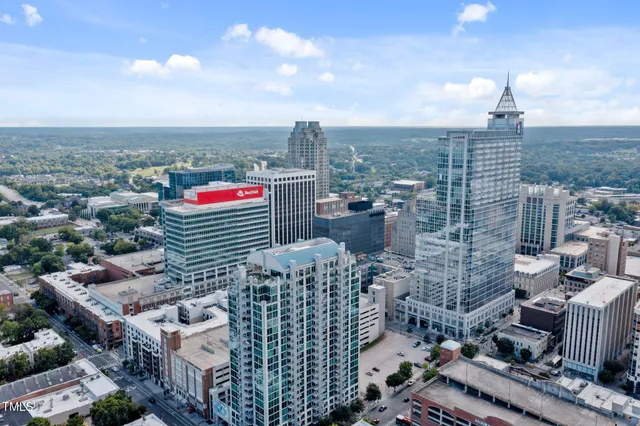 a view of a city with tall buildings