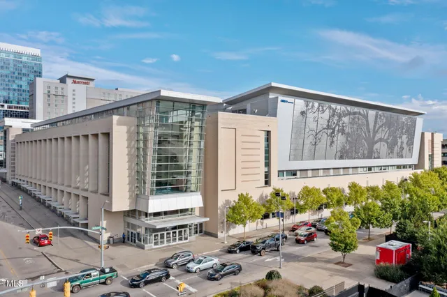 a view of a backyard with sitting area and furniture