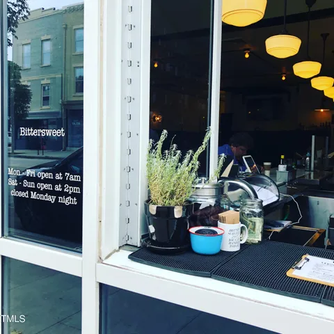 a view of a cars parked in front of a house