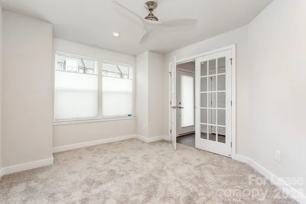 an empty room with windows