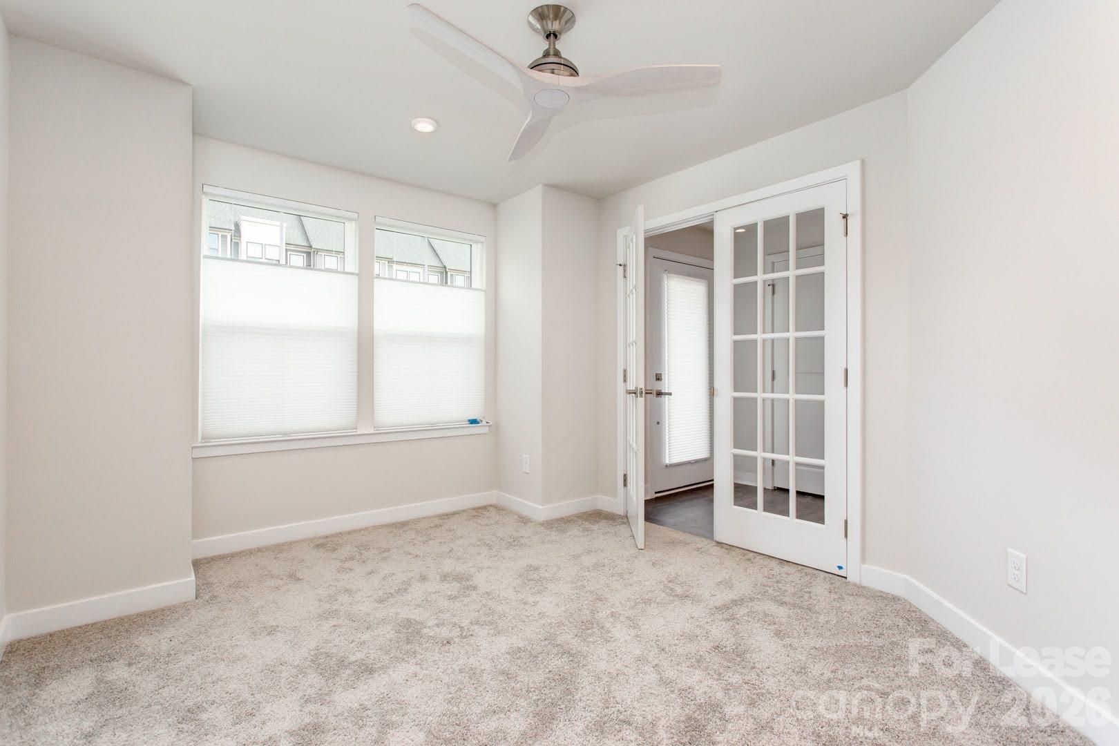 657 Uwharrie River Road Charlotte, NC 28211 - Photo 3 of 16 an empty room with windows