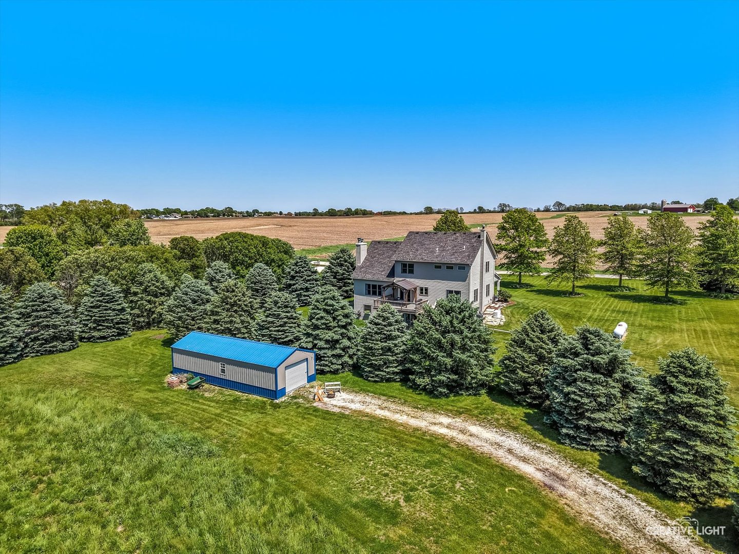 13495 Fennel Road Newark, IL 60541 - Photo 41 of 43 a view of a yard with a building in the background
