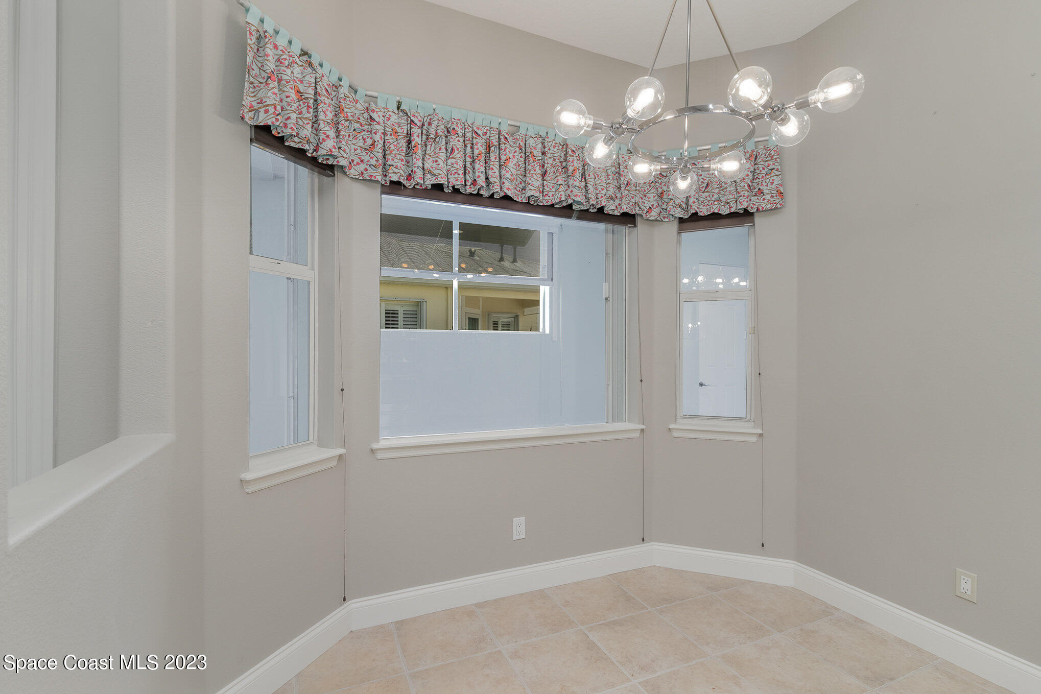 4250 Alamanda Key Drive Melbourne, FL 32901 - Photo 12 of 33 wooden floor in an empty room