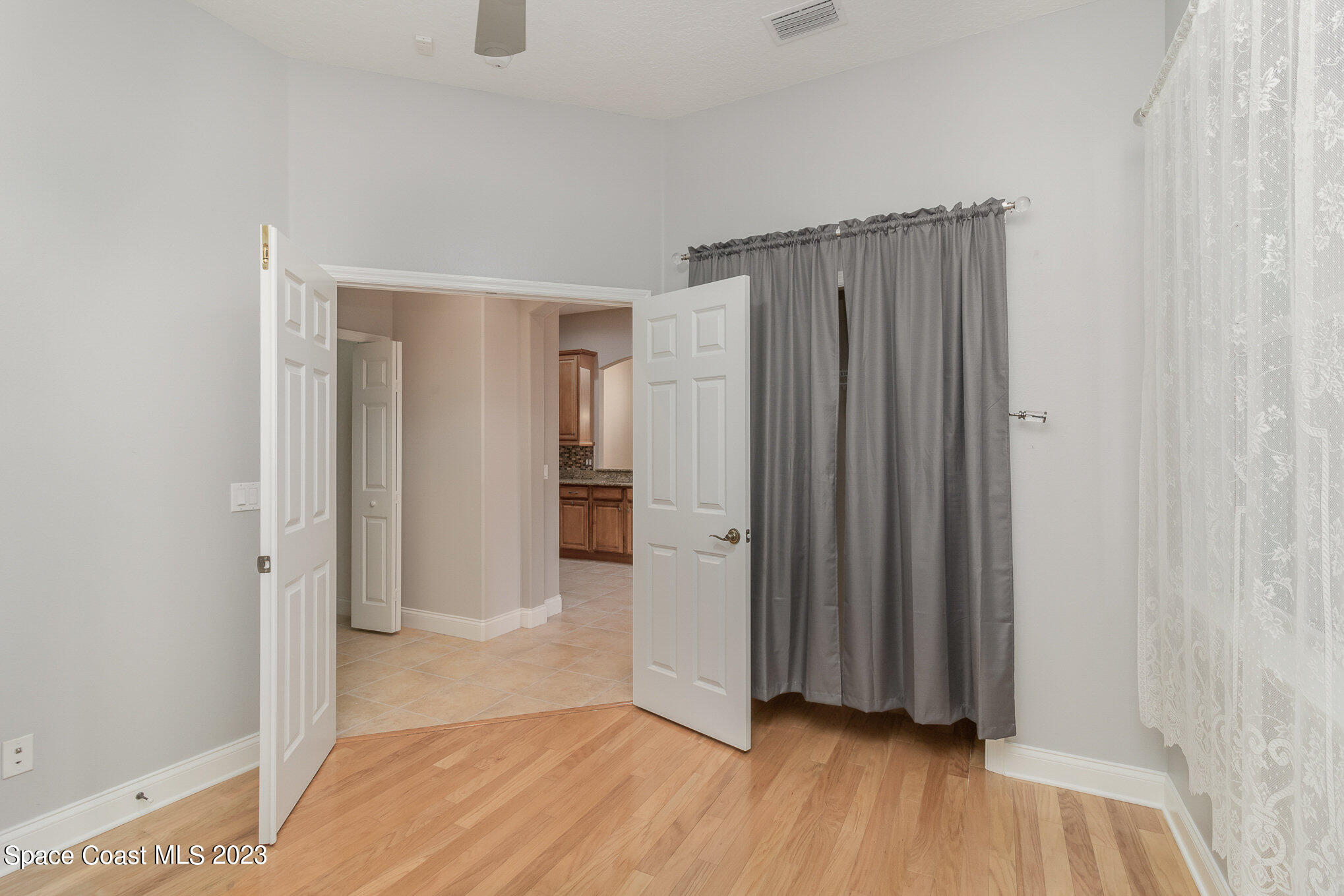 4250 Alamanda Key Drive Melbourne, FL 32901 - Photo 25 of 33 a view of a livingroom with wooden floor
