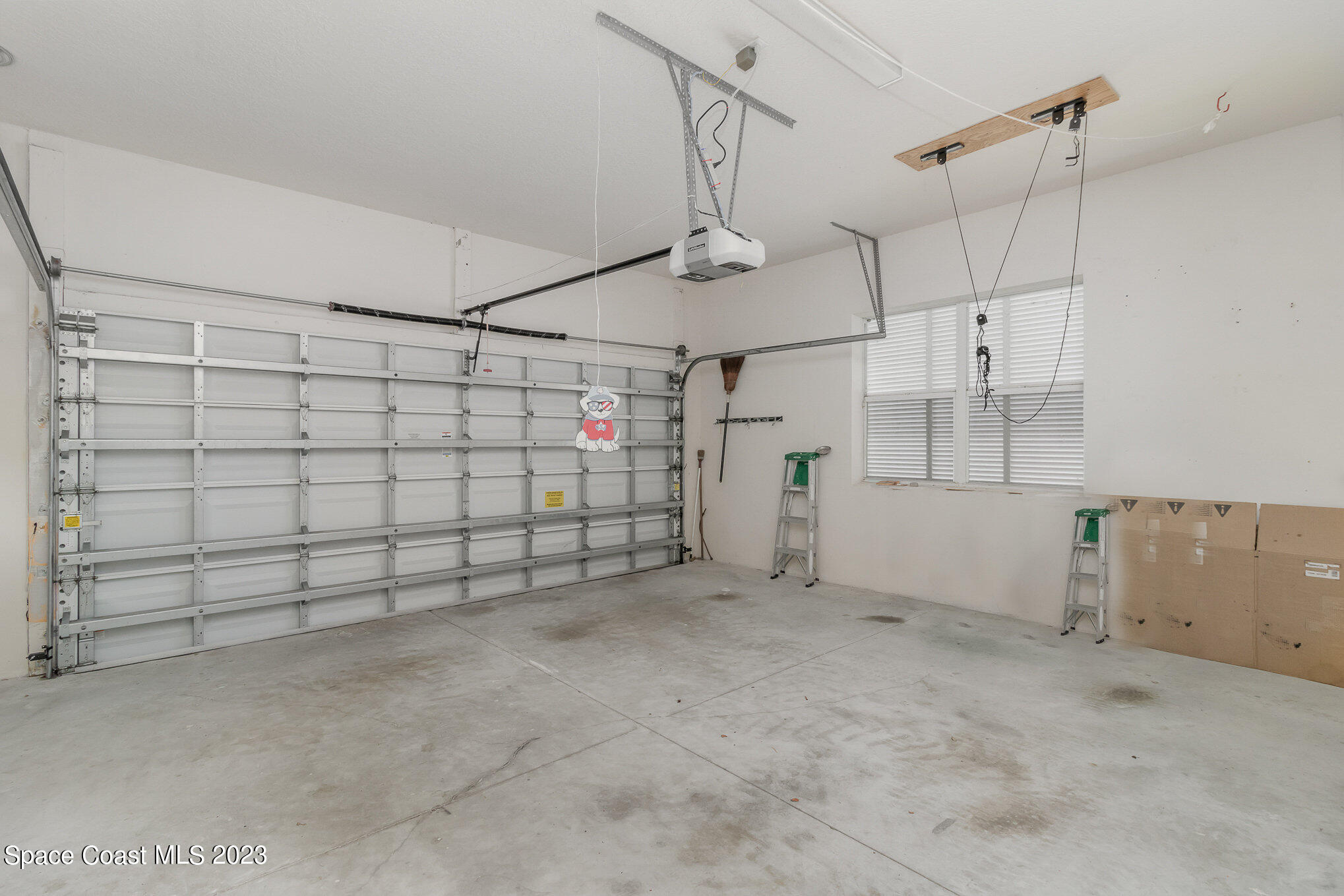 4250 Alamanda Key Drive Melbourne, FL 32901 - Photo 28 of 33 a view of a garage