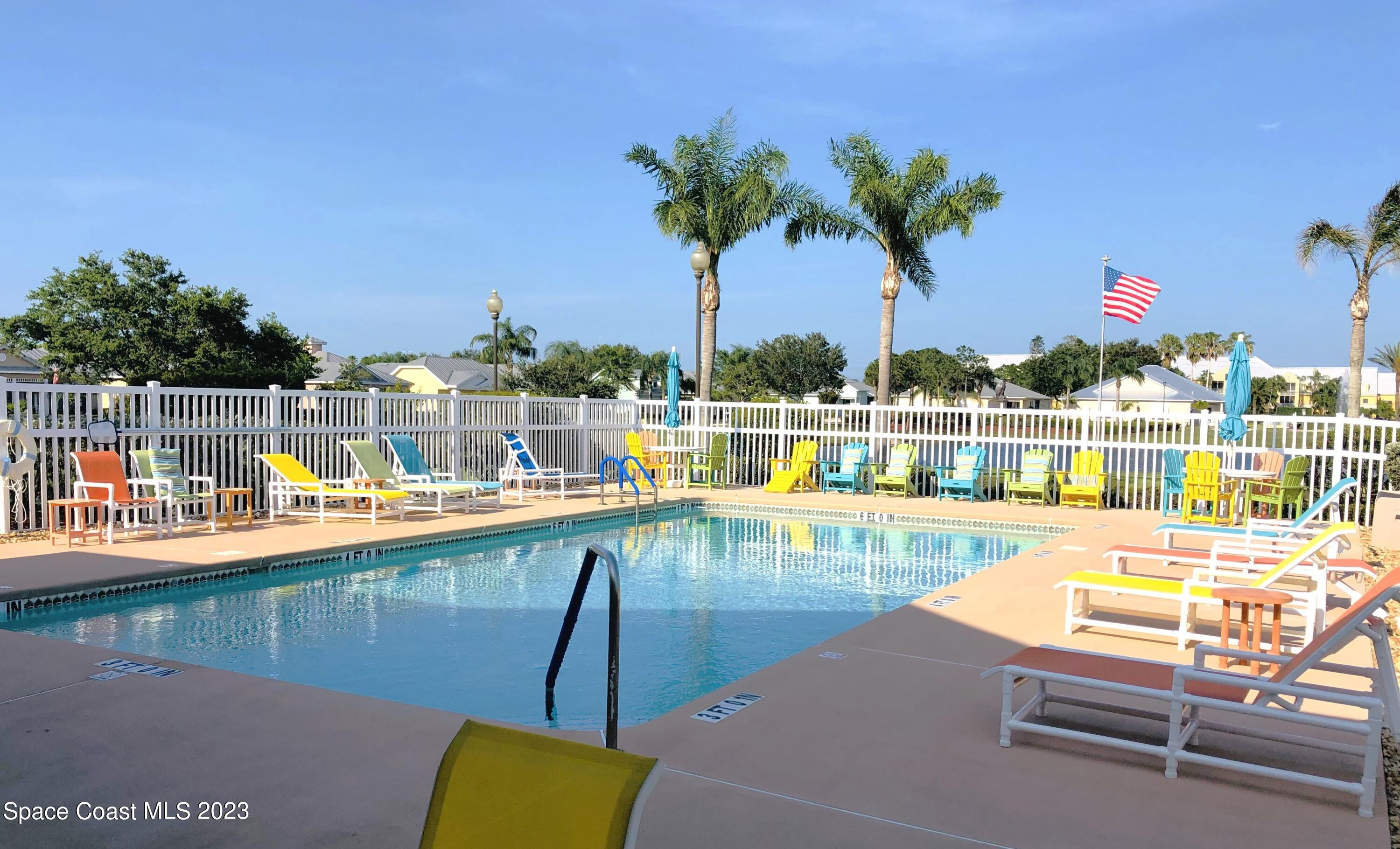 4250 Alamanda Key Drive Melbourne, FL 32901 - Photo 32 of 33 a view of swimming pool with outdoor seating