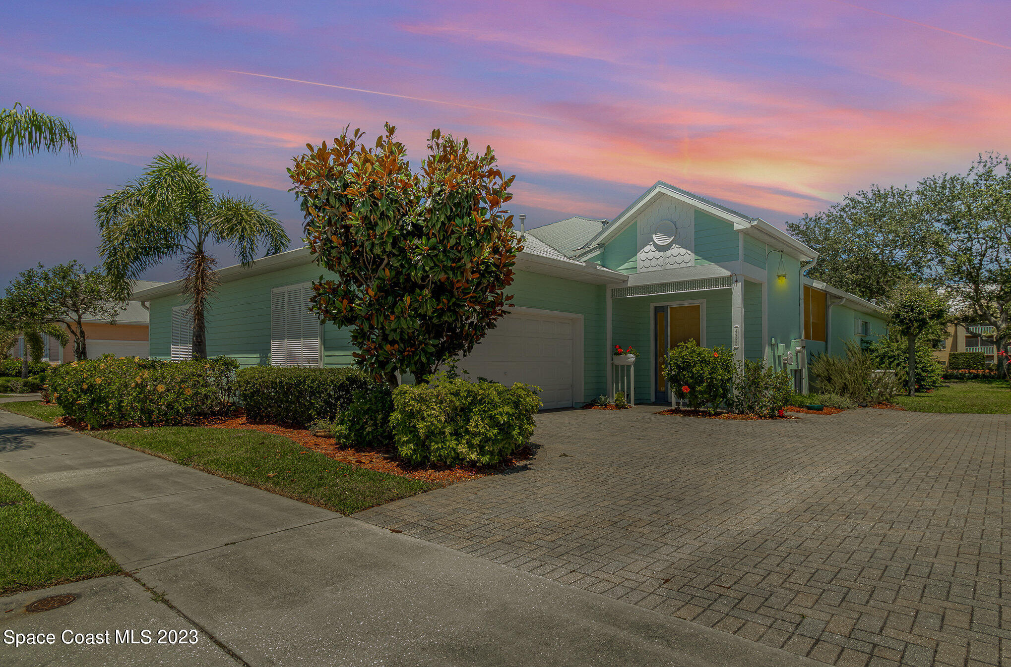 4250 Alamanda Key Drive Melbourne, FL 32901 - Photo 4 of 33 front view of a house with a yard