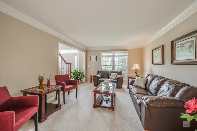 1805 Marne Road Bolingbrook, IL 60490 - Photo 6 of 27 a living room with furniture and a large window