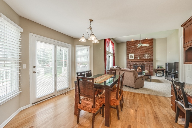 1805 Marne Road Bolingbrook, IL 60490 - Photo 10 of 27 a view of a dining room with furniture window and outside view