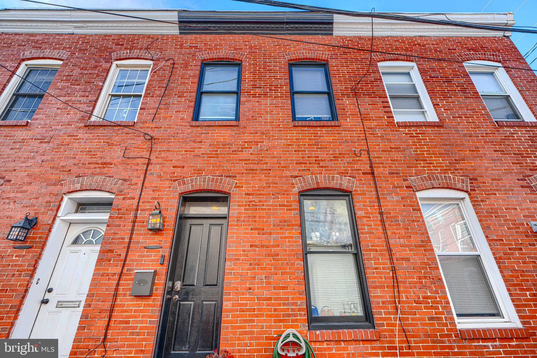 108 North Madeira Street Baltimore, MD 21231 - Photo 16 of 17 a building view with a brick wall