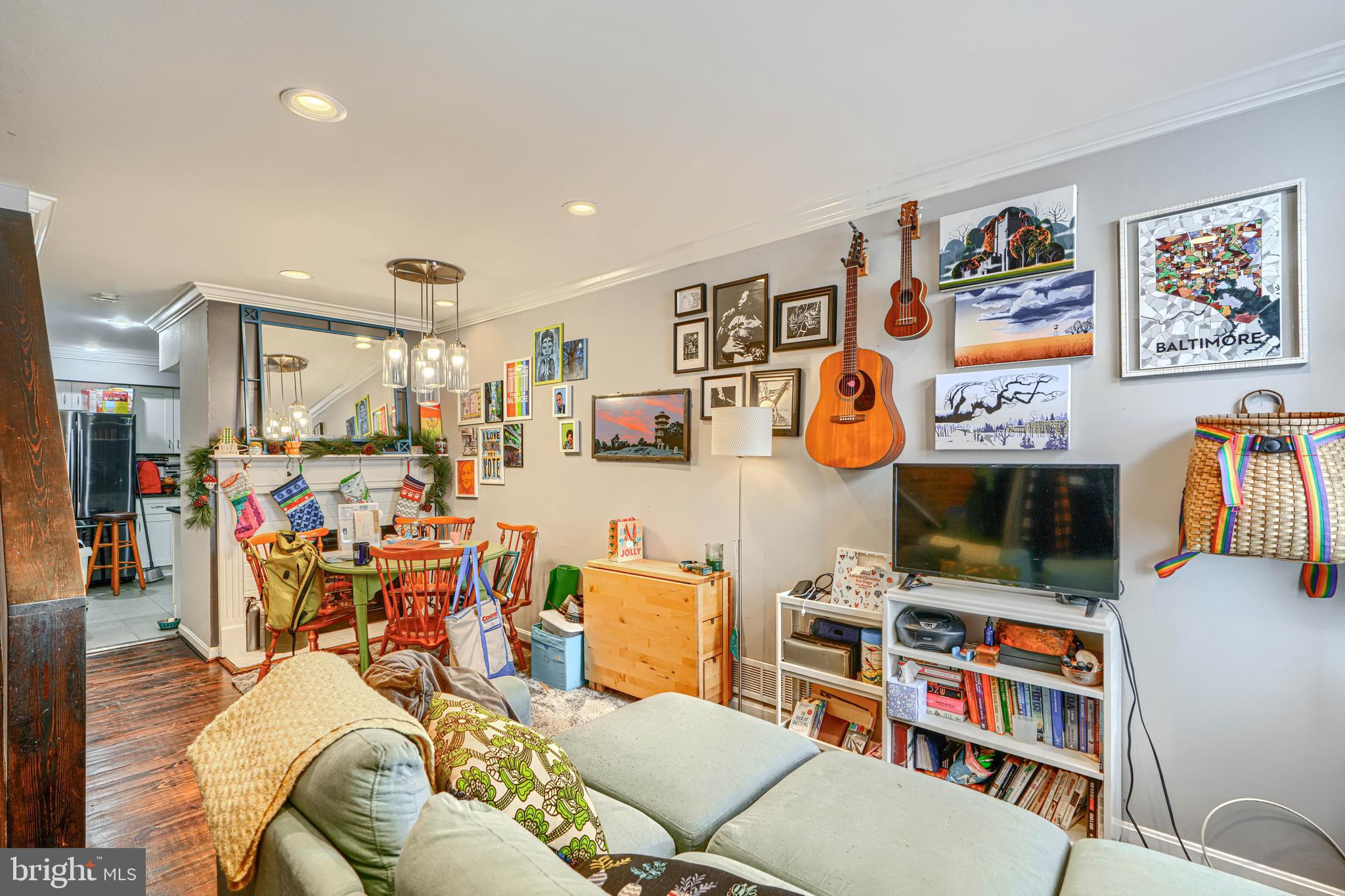 108 North Madeira Street Baltimore, MD 21231 - Photo 2 of 17 a living room with lots of furniture and workspace