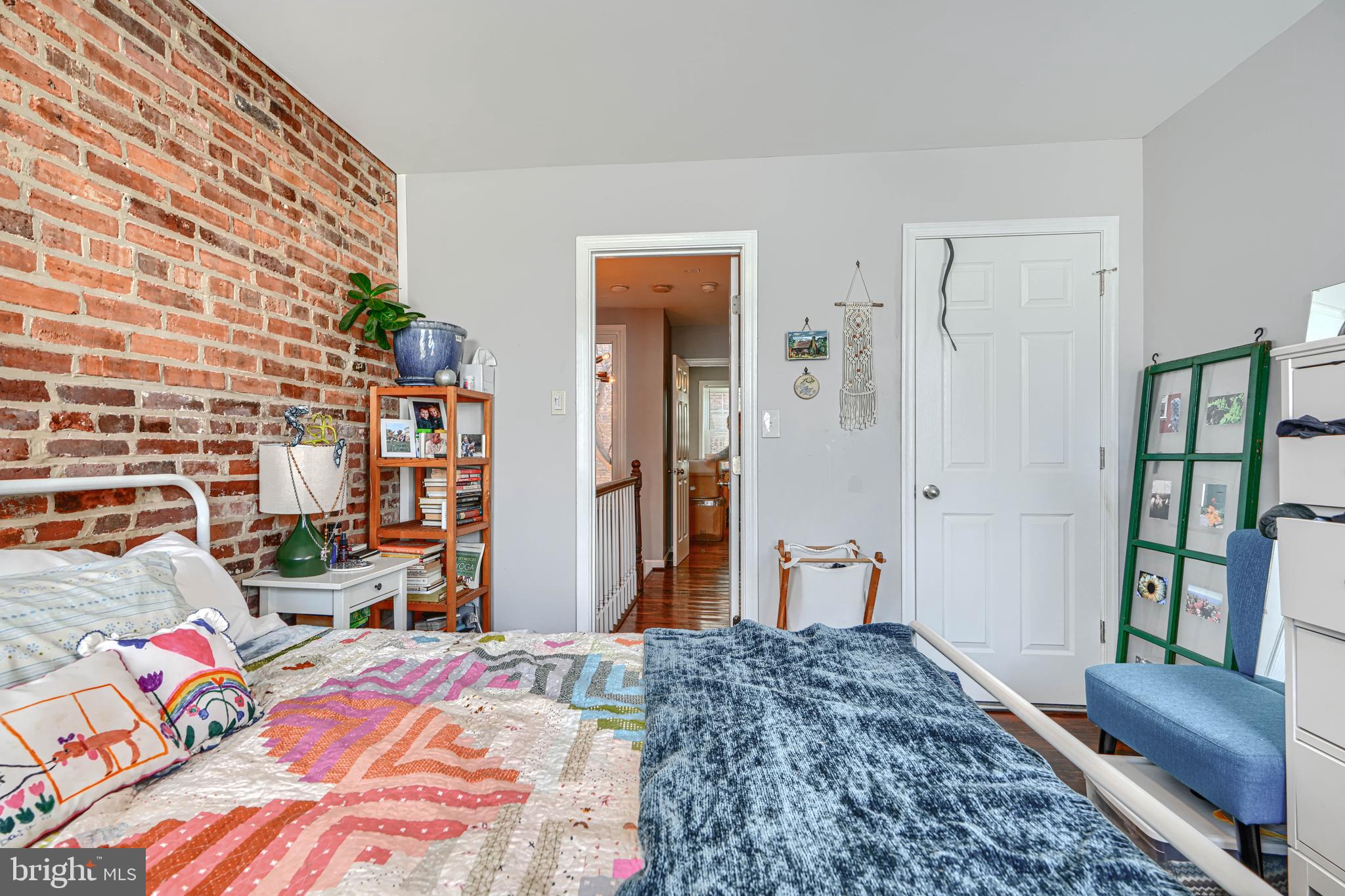 108 North Madeira Street Baltimore, MD 21231 - Photo 7 of 17 a bedroom with a bed and furniture