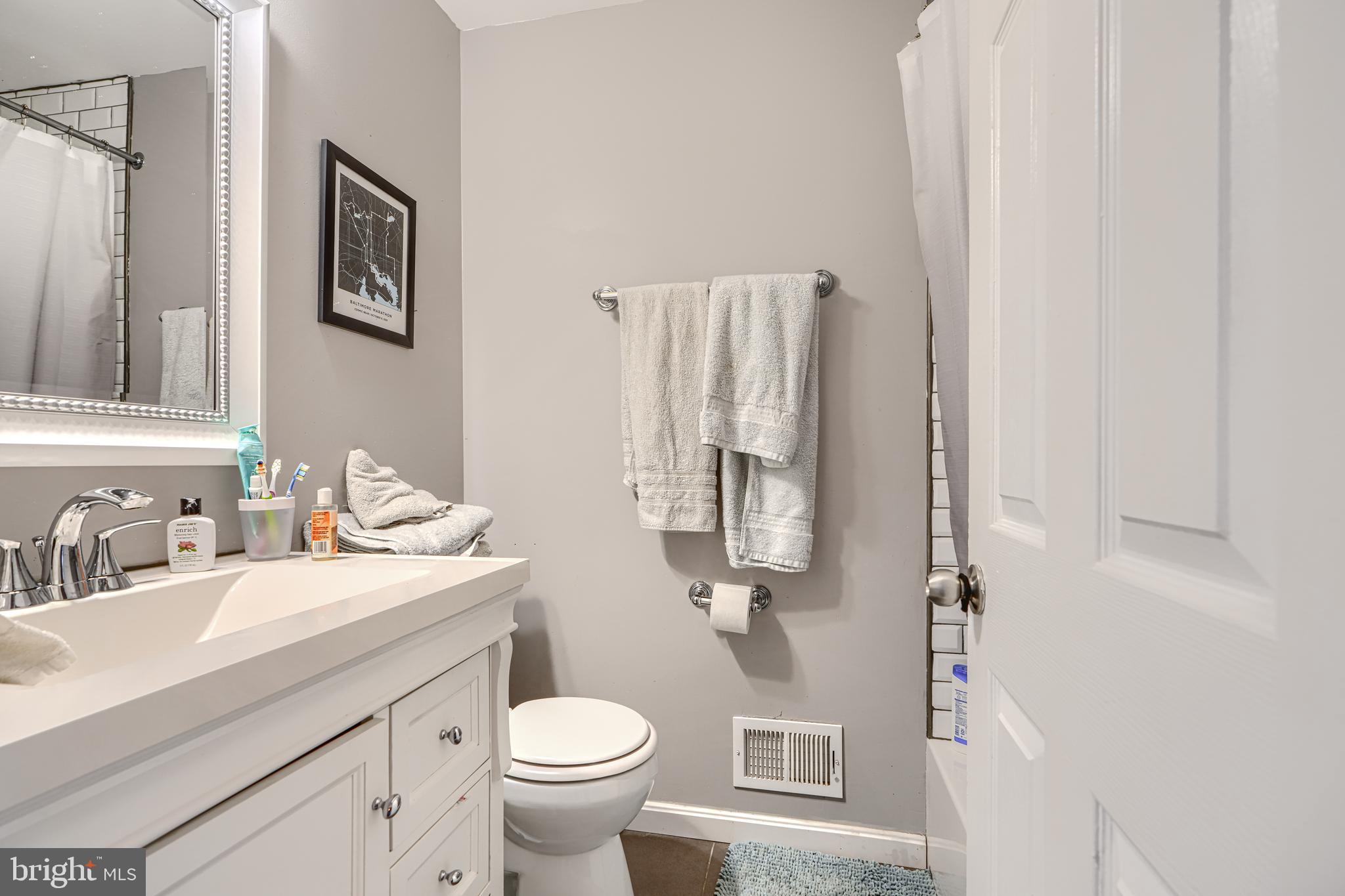 108 North Madeira Street Baltimore, MD 21231 - Photo 9 of 17 a bathroom with a sink toilet and shower
