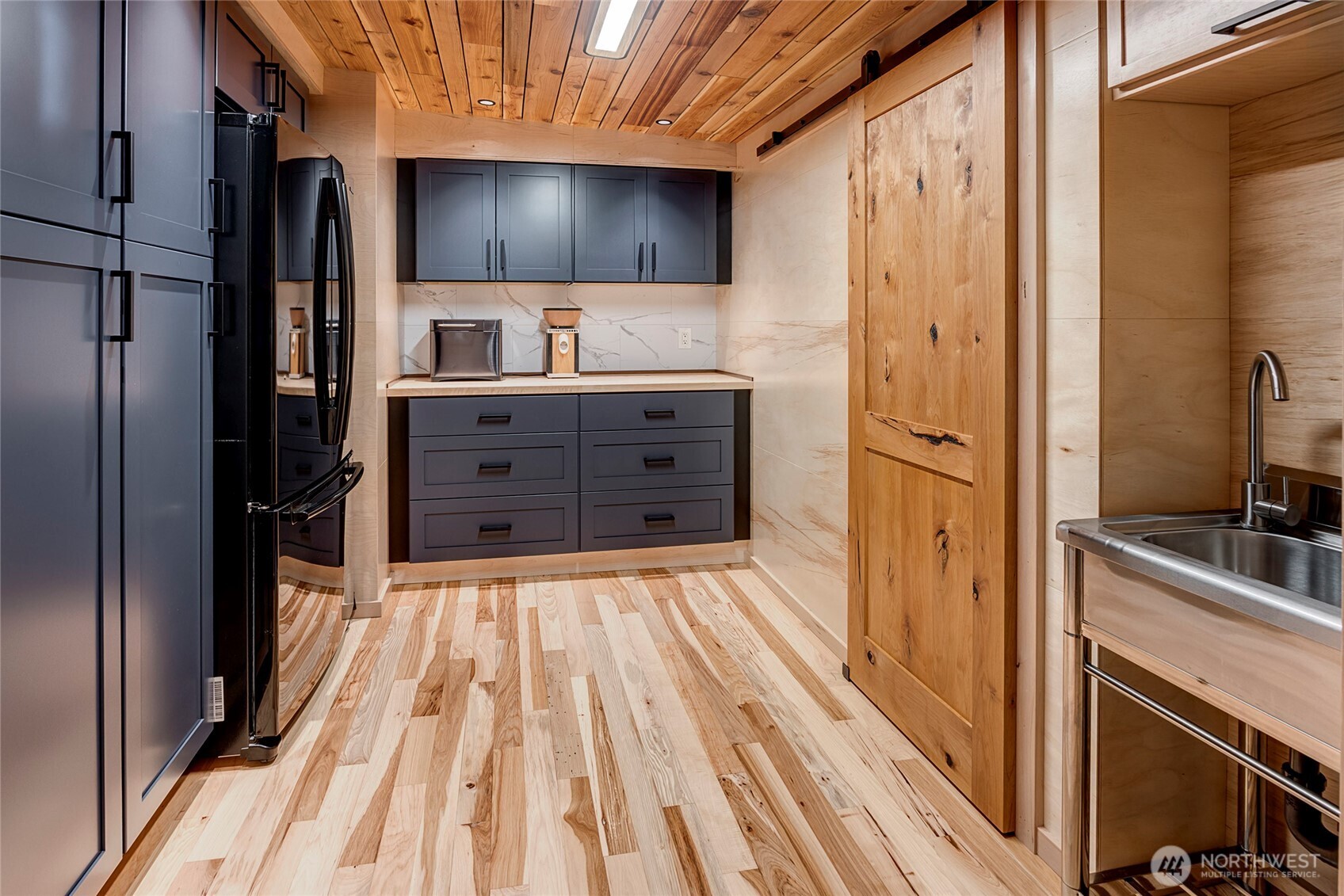 24123 7th Avenue West Bothell, WA 98021 - Photo 13 of 29 a view of a kitchen from the hallway