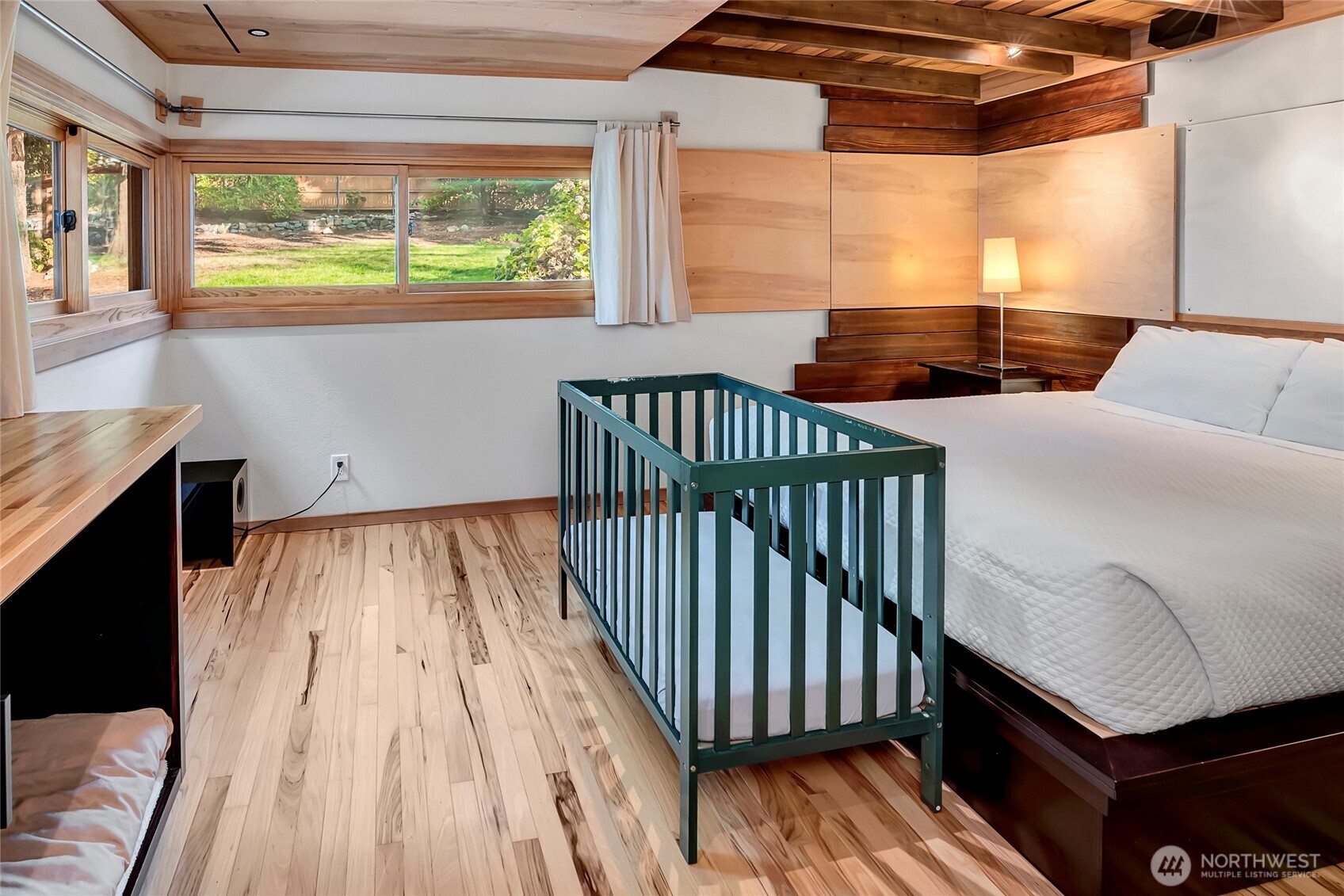 24123 7th Avenue West Bothell, WA 98021 - Photo 15 of 29 a room with wooden floor and windows