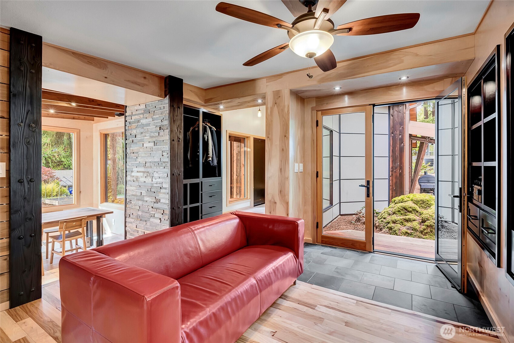 24123 7th Avenue West Bothell, WA 98021 - Photo 5 of 29 a living room with furniture and a floor to ceiling window
