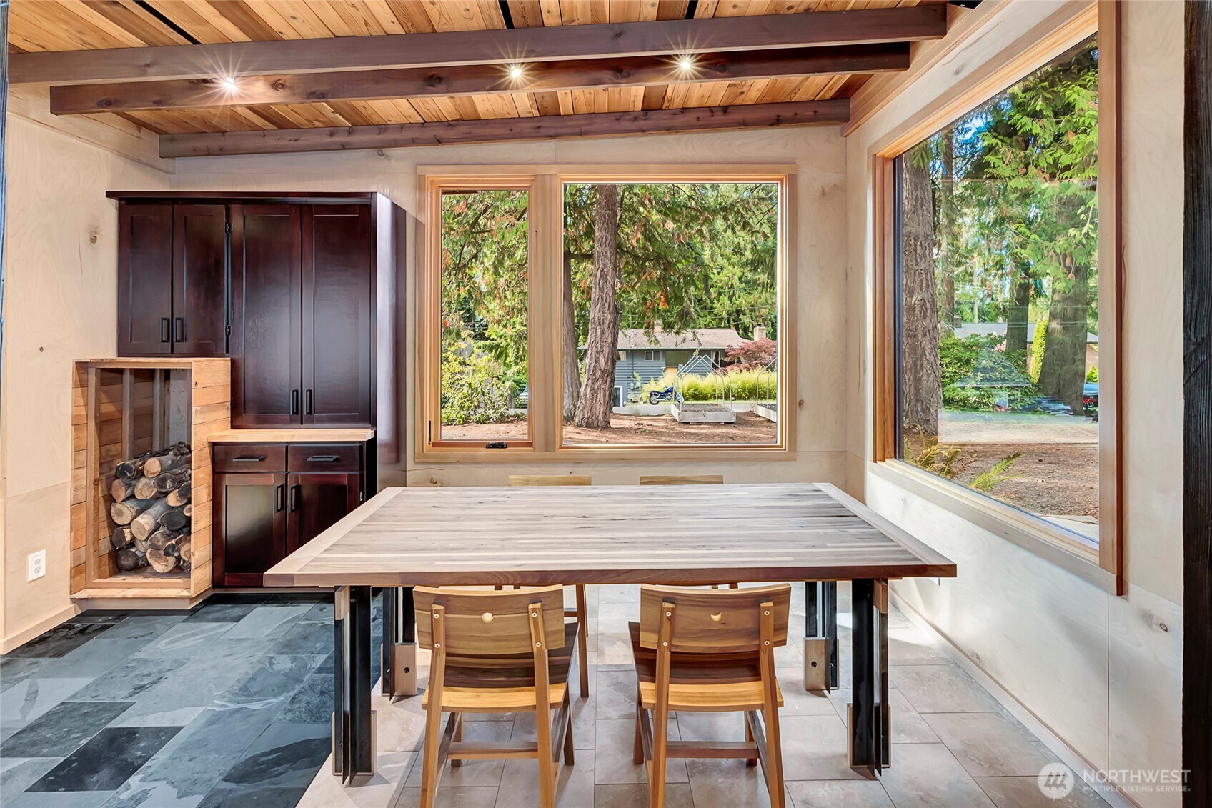 24123 7th Avenue West Bothell, WA 98021 - Photo 7 of 29 a dining room with a table and chairs