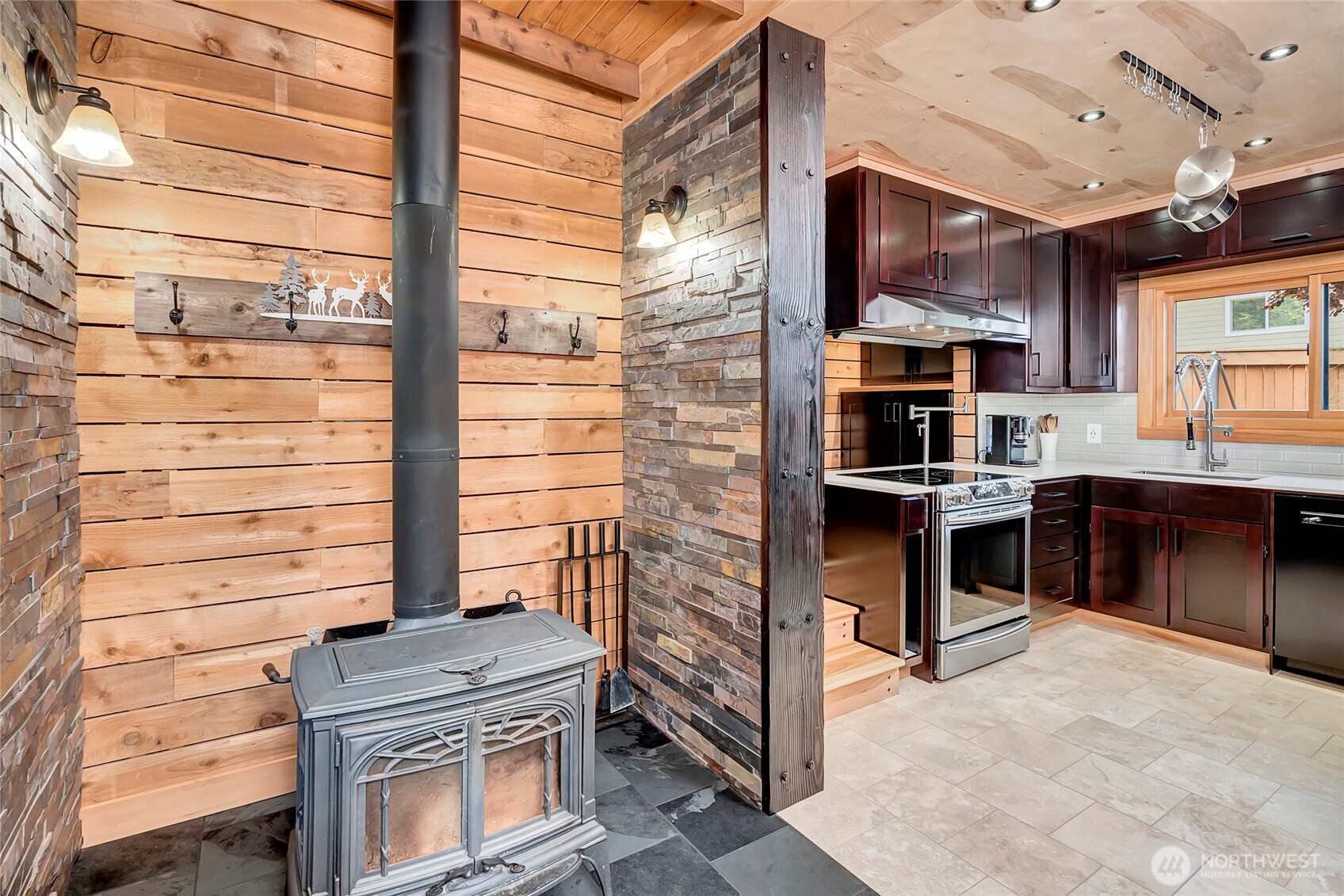 24123 7th Avenue West Bothell, WA 98021 - Photo 9 of 29 a kitchen with a stove and a cabinet